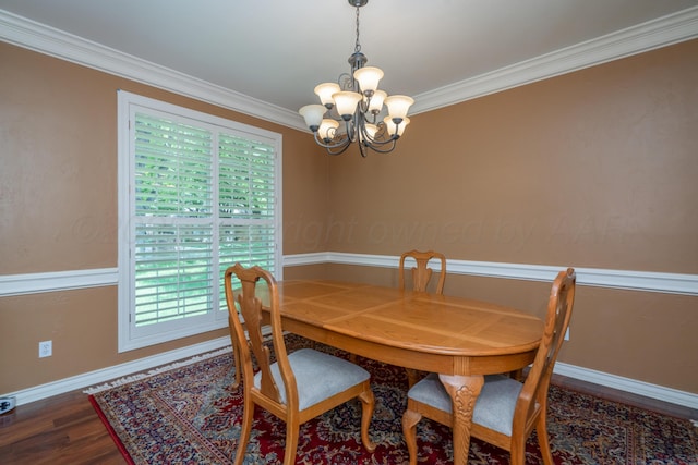 3501 Van Winkle Dr, Amarillo, TX 79121 - dining space featuring a chandelier, crown molding, wood finished floors, and baseboards