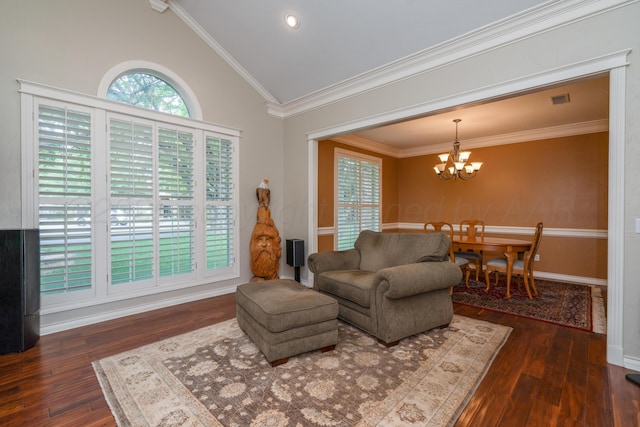 3501 Van Winkle Dr, Amarillo, TX 79121 - living room featuring a chandelier, hardwood / wood-style flooring, ornamental molding, baseboards, and high vaulted ceiling