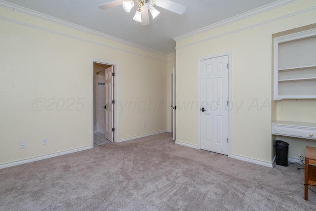 3501 Van Winkle Dr, Amarillo, TX 79121 - unfurnished bedroom with crown molding, carpet floors, baseboards, and connected bathroom