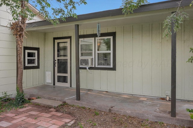 1805 Broadmoor St, Amarillo, TX 79106 - doorway to property with a porch and board and batten siding