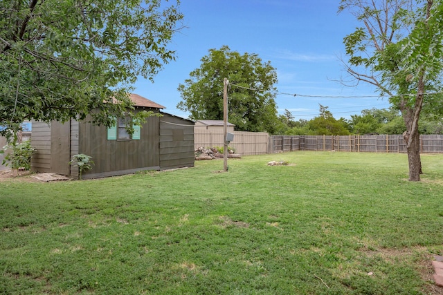 1805 Broadmoor St, Amarillo, TX 79106 - fenced backyard featuring a storage unit