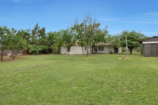 1805 Broadmoor St, Amarillo, TX 79106 - view of yard with a storage unit