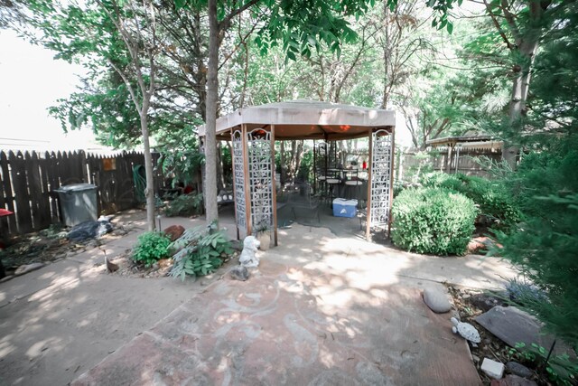 4204 Harmony St, Amarillo, TX 79109 - fenced backyard featuring a gazebo and a patio