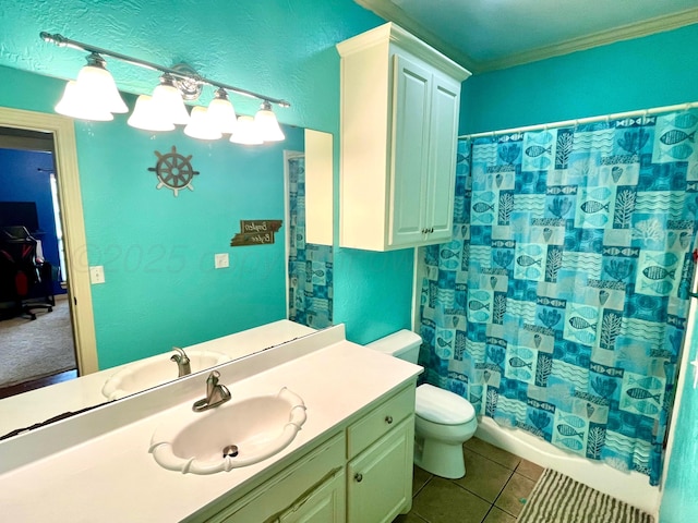 8400 El Paso Dr, Amarillo, TX 79118 - bathroom with toilet, ornamental molding, tile patterned floors, and vanity