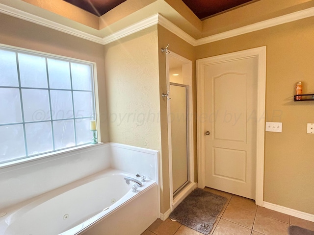 8400 El Paso Dr, Amarillo, TX 79118 - full bathroom with a shower stall, tile patterned flooring, baseboards, and a tub with jets