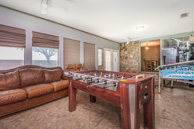 game room with ceiling fan