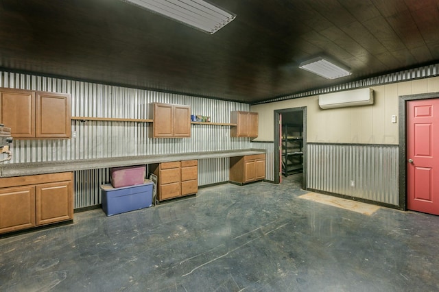 kitchen featuring wood walls, wood ceiling, and a wall unit AC