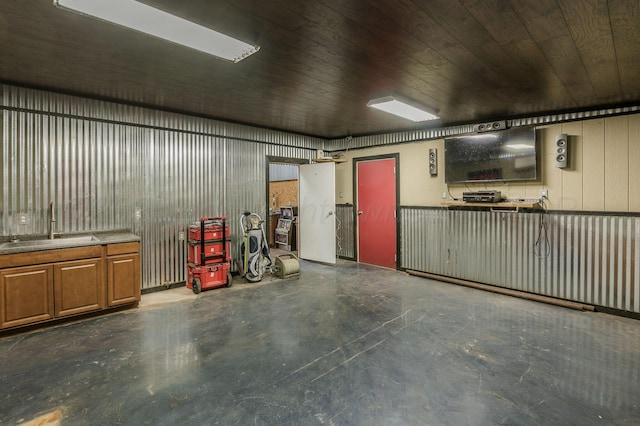 garage with wooden ceiling and sink