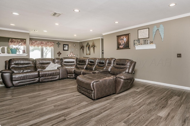 home theater featuring wood-type flooring and ornamental molding