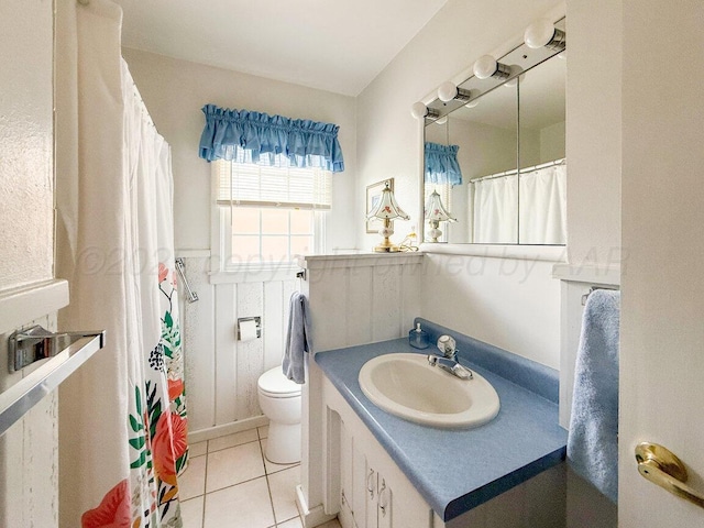 3406 Meadow Dr, Amarillo, TX 79109 - full bath featuring vanity, tile patterned flooring, and a shower with curtain