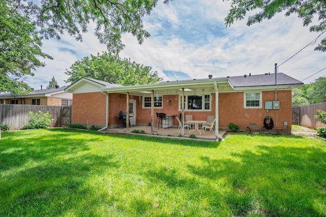 3406 Meadow Dr, Amarillo, TX 79109 - rear view of house featuring brick siding, a fenced backyard, and a patio area