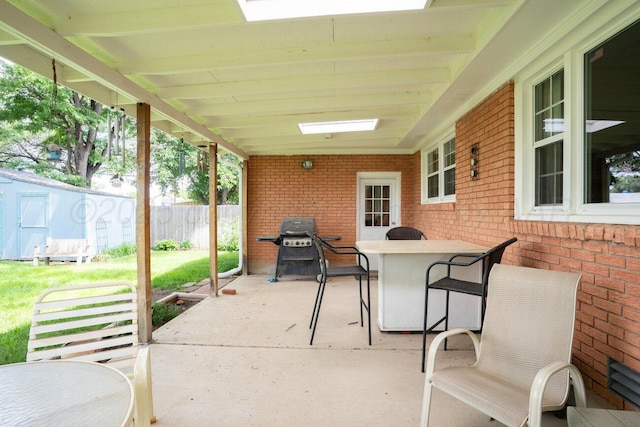 3406 Meadow Dr, Amarillo, TX 79109 - view of patio with a shed and grilling area