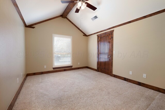 spare room with lofted ceiling with beams, visible vents, light carpet, and baseboards