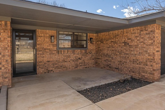 view of patio featuring a carport