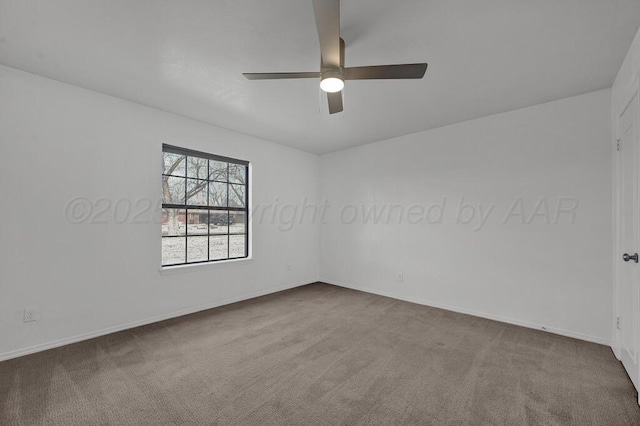 empty room featuring carpet flooring, ceiling fan, and baseboards