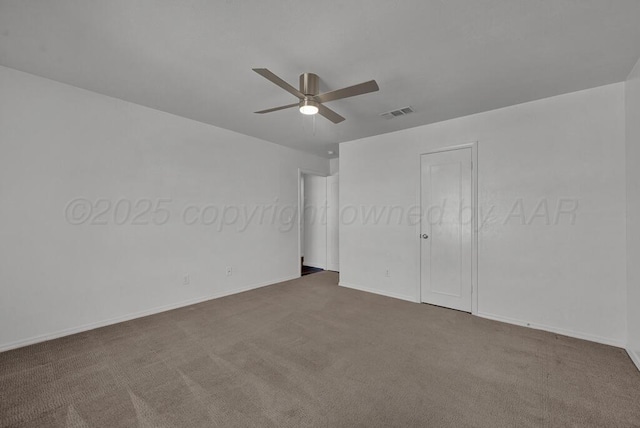 unfurnished bedroom with ceiling fan, carpet flooring, visible vents, baseboards, and a closet