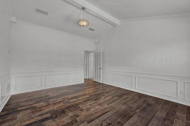 spare room with lofted ceiling with beams, dark wood finished floors, visible vents, and crown molding