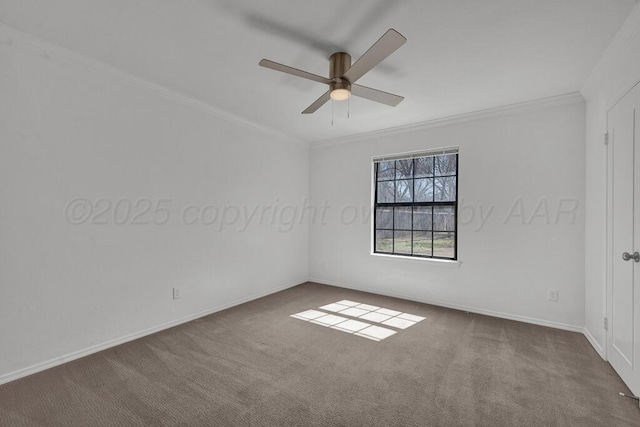 spare room featuring carpet floors, ornamental molding, a ceiling fan, and baseboards