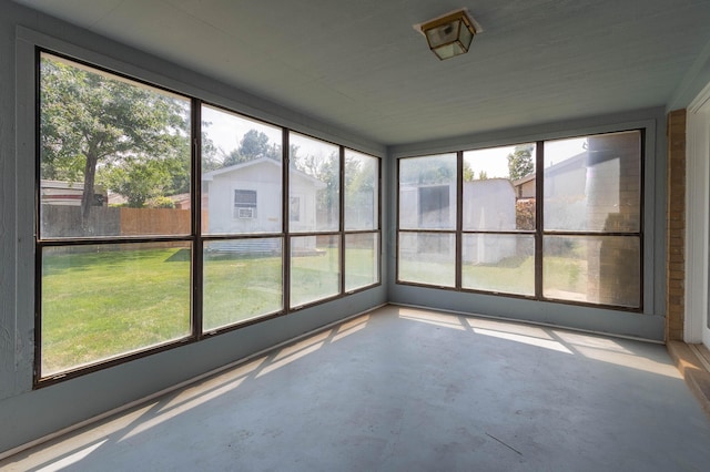 unfurnished sunroom with a healthy amount of sunlight