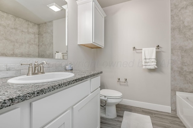 9209 Lexford Dr, Amarillo, TX 79119 - full bath featuring vanity and wood finished floors