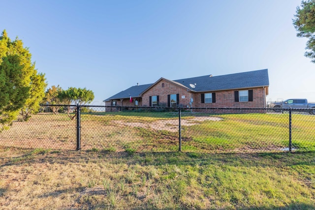 ranch-style home with a front yard