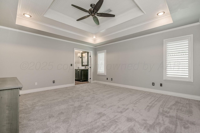 7723 Stuyvesant Ave, Amarillo, TX 79121 - spare room featuring a raised ceiling, crown molding, a ceiling fan, light carpet, and recessed lighting