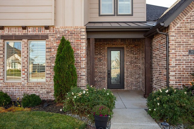 5609 Hollow Landing Ave, Amarillo, TX 79118 - entrance to property with brick siding and a standing seam roof