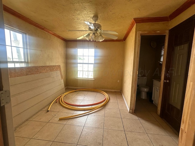 316 SE 21st Ave, Amarillo, TX 79109 - interior space featuring ornamental molding, a ceiling fan, and a healthy amount of sunlight