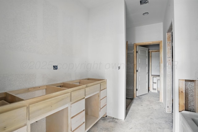 bathroom featuring concrete floors