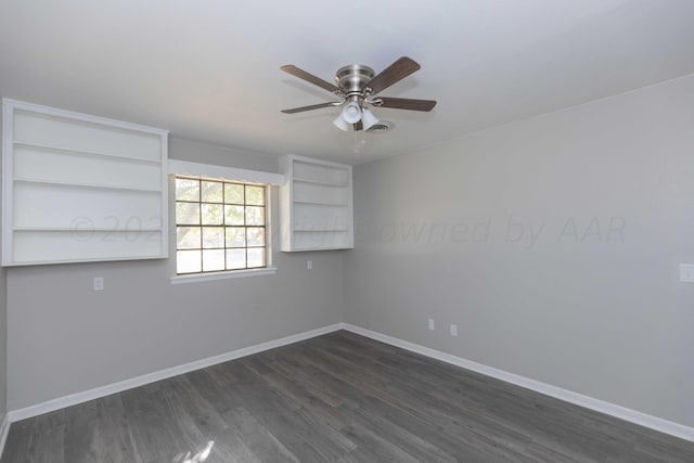 empty room with dark wood-type flooring and ceiling fan