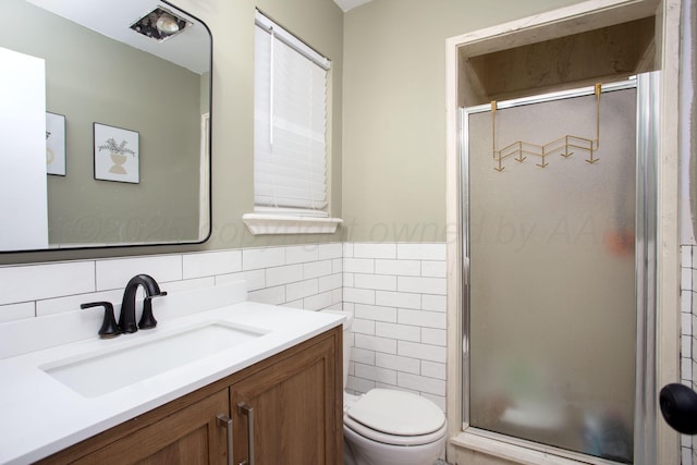 4818 SE 33rd Ave, Amarillo, TX 79103 - full bathroom with tile walls, vanity, a stall shower, and wainscoting