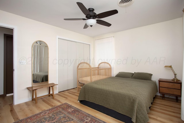 4818 SE 33rd Ave, Amarillo, TX 79103 - bedroom featuring light wood-type flooring, a ceiling fan, and a closet