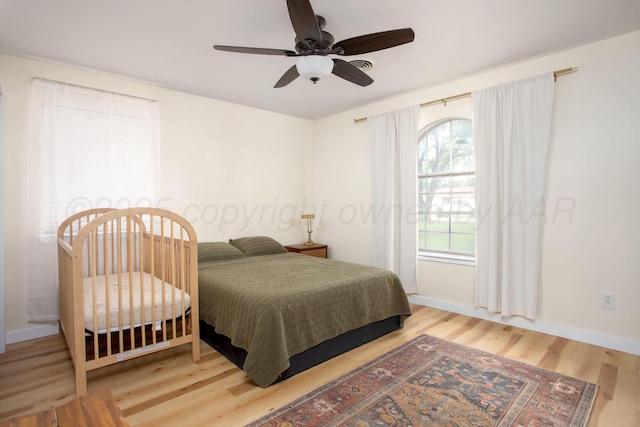 4818 SE 33rd Ave, Amarillo, TX 79103 - bedroom featuring wood finished floors and a ceiling fan