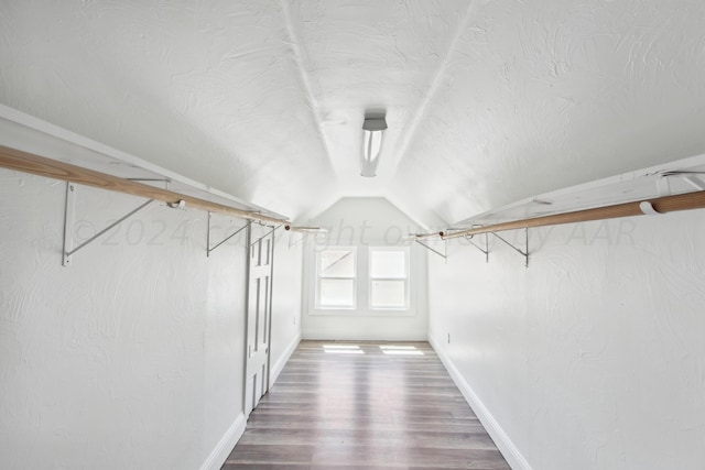818 N Someville St, Pampa, TX 79065 - spacious closet featuring vaulted ceiling and wood finished floors