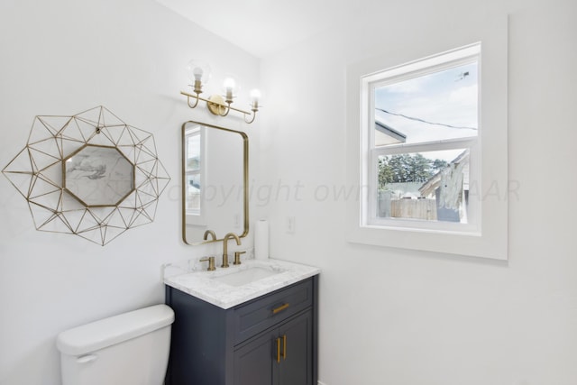 818 N Someville St, Pampa, TX 79065 - bathroom with plenty of natural light, toilet, and vanity