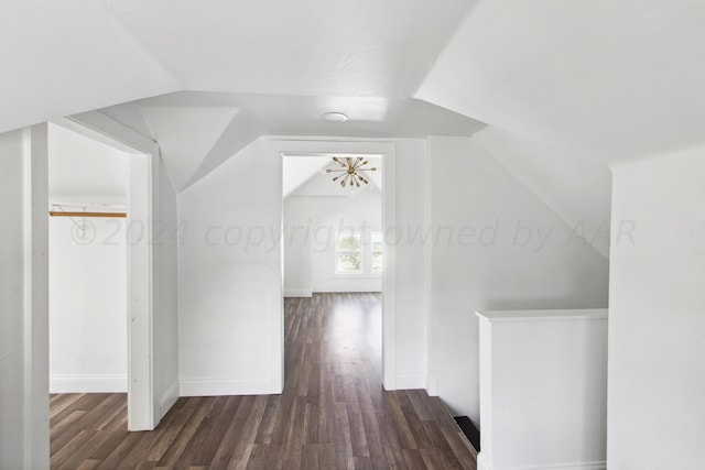 818 N Someville St, Pampa, TX 79065 - bonus room featuring baseboards, vaulted ceiling, and wood finished floors