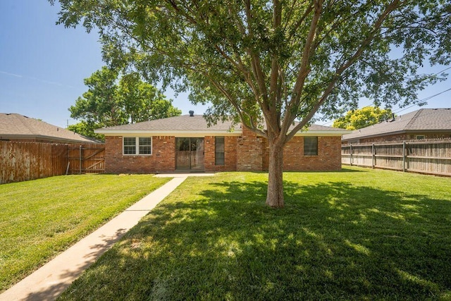 7935 Mitcham Dr, Amarillo, TX 79121 - rear view of property with brick siding