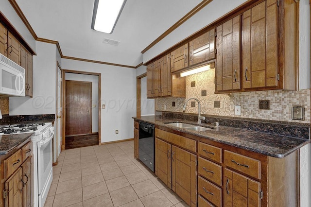 7935 Mitcham Dr, Amarillo, TX 79121 - kitchen featuring white appliances, a sink, backsplash, brown cabinets, and crown molding