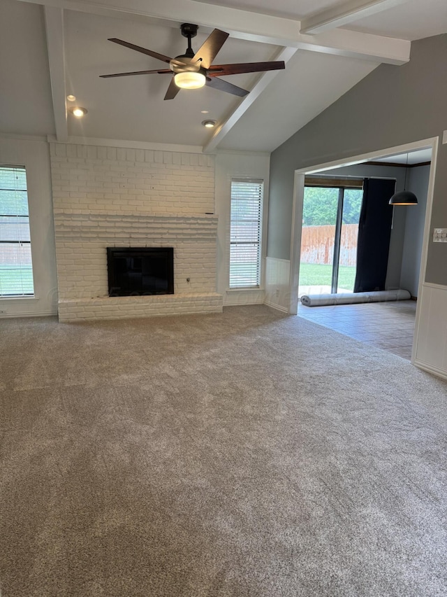 7935 Mitcham Dr, Amarillo, TX 79121 - unfurnished living room with carpet floors, a wainscoted wall, a ceiling fan, a fireplace, and recessed lighting