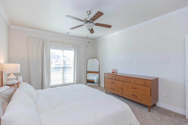 bedroom featuring light carpet, baseboards, ornamental molding, and ceiling fan