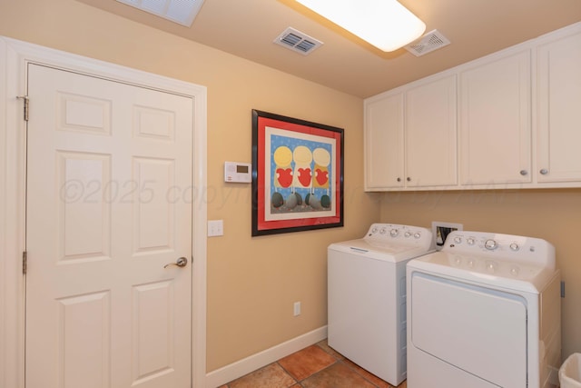 6504 Bayberry Ln, Amarillo, TX 79124 - laundry room featuring cabinet space, washing machine and clothes dryer, baseboards, and light tile patterned floors
