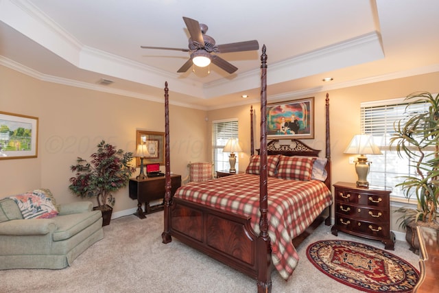 6504 Bayberry Ln, Amarillo, TX 79124 - bedroom featuring a raised ceiling, ornamental molding, light carpet, a ceiling fan, and baseboards