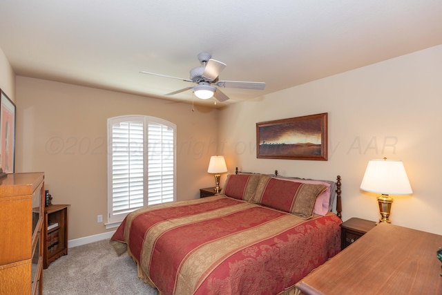 6504 Bayberry Ln, Amarillo, TX 79124 - bedroom with light carpet, ceiling fan, and baseboards
