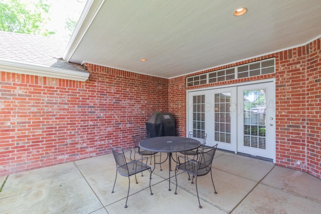6504 Bayberry Ln, Amarillo, TX 79124 - view of patio featuring a grill and outdoor dining area