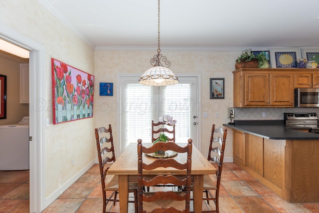 6504 Bayberry Ln, Amarillo, TX 79124 - dining room featuring washer / clothes dryer, ornamental molding, and baseboards