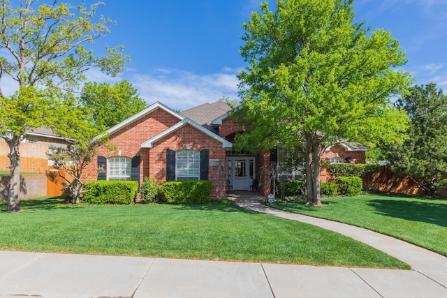 6504 Bayberry Ln, Amarillo, TX 79124 - view of front of property featuring brick siding and a front yard