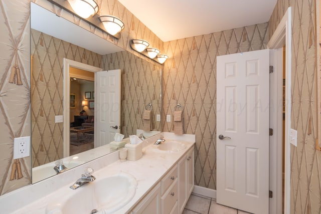 6504 Bayberry Ln, Amarillo, TX 79124 - bathroom with wallpapered walls, double vanity, and tile patterned floors