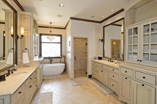 bathroom featuring tile walls, tile patterned flooring, plus walk in shower, vanity, and crown molding