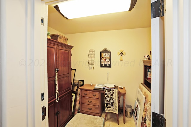 bathroom with tile patterned floors