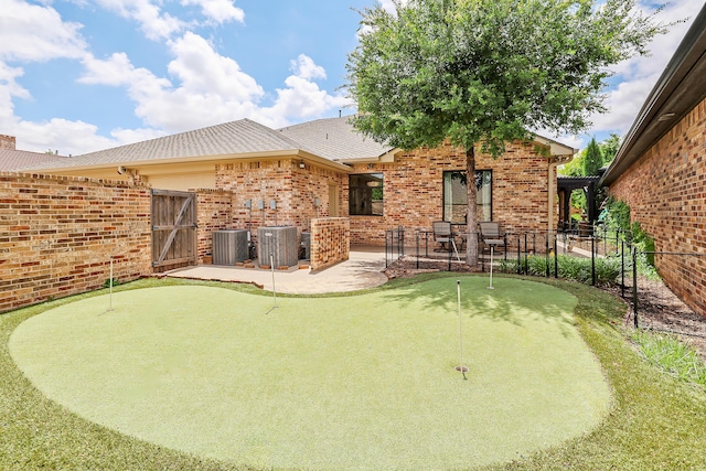 back of property featuring a patio area and cooling unit